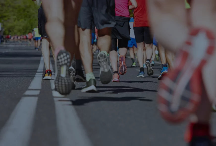 Runners at the starting line of a race with blurred motion